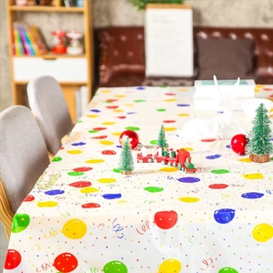 Detail of disposable rectangle tablecloth with colorful balloons and Happy Birthday text