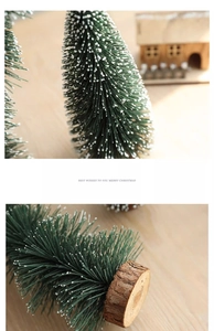 Detail of mini flocked Christmas trees with snow effect and natural wooden bases