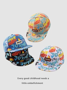 Detail of colorful graffiti print kids flat brim hip hop caps with leather patch