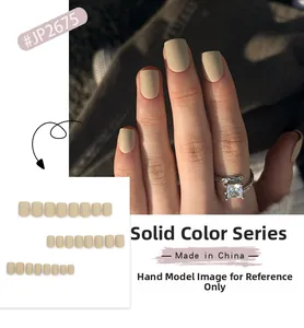 Macro detail of matte nude square press-on nails set with model hand display JP2675
