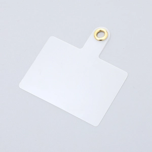 Detailed view of a clear PVC phone tether tab with a premium gold metal ring connector