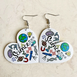 Science themed heart shaped faux leather earrings featuring microscope and DNA patterns