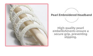 Detailed view of white faux pearl embroidered headbands with non-slip secure design
