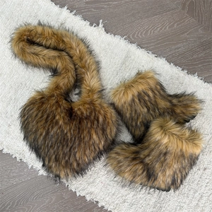 Plush faux fur heart-shaped crossbody bag and matching winter boots set in brown mix