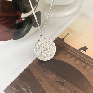 Retro 925 sterling silver coin necklace featuring a Saint George relief and 1901 engraving