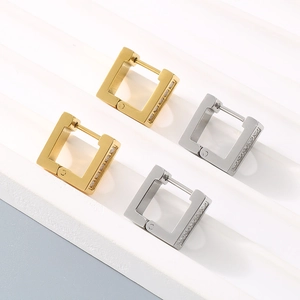 Minimalist square zircon hoop earrings in 18k gold and silver plating on white steps