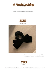 Macro detail of a 12cm black velvet bow scrunchie with French vintage aesthetic design