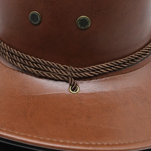 Detail of brown faux leather cowboy hat featuring metal eyelets and twisted rope band