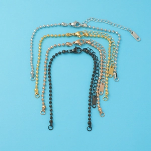 Close-up of four colors 2.5mm stainless steel bead bracelets with lobster clasps and extenders