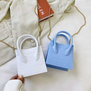 Chic crocodile pattern crossbody bags in white and blue with gold chain straps