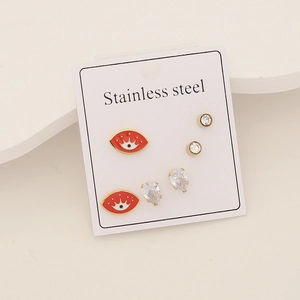 Detailed set of 3 pairs stainless steel studs with red evil eyes and clear cubic zirconia