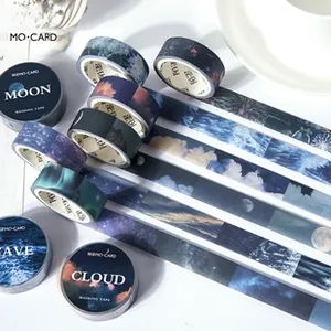 Detail of aesthetic washi tape set featuring celestial moon and wave photography prints