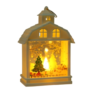 Christmas LED lantern with snowman and reindeer scene emitting warm yellow light
