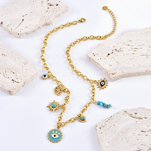 French vintage gold necklace with blue evil eye pendant and turquoise sun flower charms