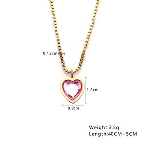 Macro detail of gold square chain with pink heart enamel pendant and size specifications