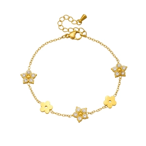 Gold plated stainless steel flower bracelet with sparkling star-shaped rhinestones