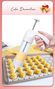 Action shot of handheld piping gun extruding cookie dough onto a baking sheet