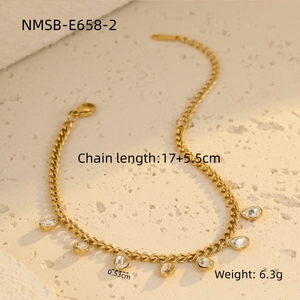 Detail of gold chain bracelet with teardrop crystal charms and size specifications