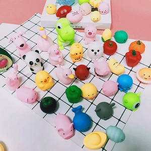 Variety pack of colorful cute animal mochi squishy toys including pigs and ducks