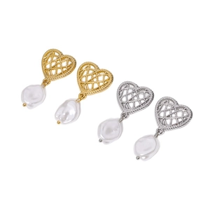 Vintage gold and silver heart-shaped pearl earrings with baroque texture on white background