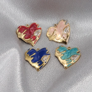 Enamel heart pendants with cubic zirconia inlay in red, pink, blue, and teal colors