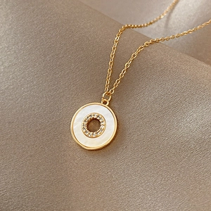 Elegant gold titanium steel necklace with iridescent mother of pearl and crystal pendant