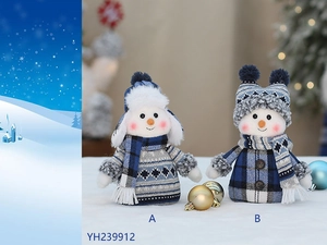 Detail of two Christmas plush snowmen in blue and white knit sweaters and scarves