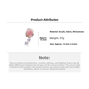 Dettagli di una pinza per capelli con fiori rosa e nappine a farfalla e misure
