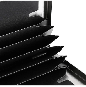 Detailed macro view of the brushed stainless steel case with 6 accordion card slots
