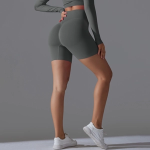 Detailed back view of high waist seamless yoga shorts with push-up peach lift effect