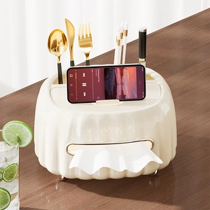Creamy white multifunctional tissue box with wavy texture and storage slots for cutlery