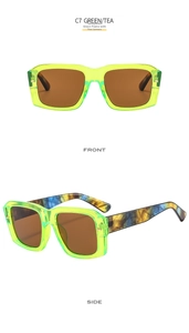 Detail view of square green sunglasses with colorful tortoiseshell temples and tea lenses