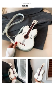Detail view of white guitar-shaped bag featuring strings and brown fretboard print