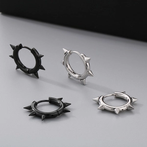 Punk style stainless steel Mobius hoop earrings with cone spikes in black and silver