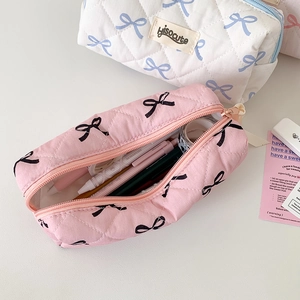 Quilted bow stationery pouch in pink and white with high-capacity zipper storage