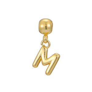 Detailed view of a 18k gold plated 3D bubble initial M pendant with a polished finish