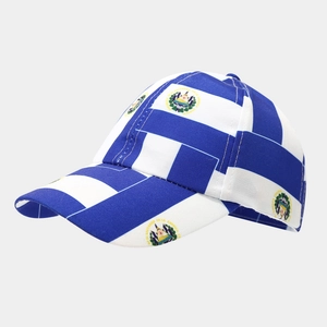 Close-up of blue and white striped kids cap featuring El Salvador flag and coat of arms