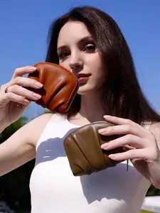 Minimalist pleated leather mini wallet for women in brown and green with zipper closure