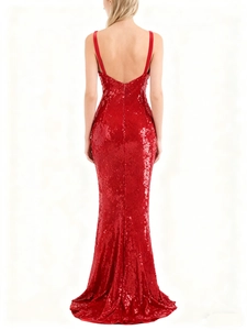 Close-up of the back view showing sequins, open back, and mermaid hem on red evening gown