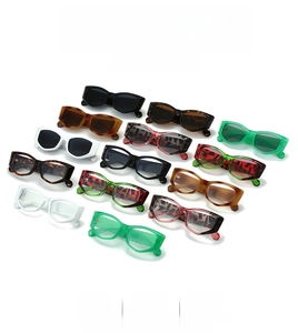 Detailed grid showing trendy small cat eye sunglasses in various vibrant colors and patterns