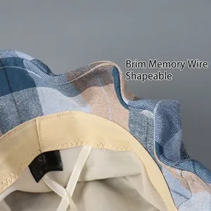 Blue plaid sun hat with shapeable memory wire brim and moisture-wicking sweatband