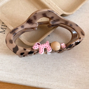 Maillard acrylic leopard print dog hair claw clip with vintage oval tortoiseshell design
