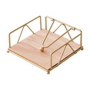 Minimalist square metal napkin holder with wooden base and movable golden arm for table storage