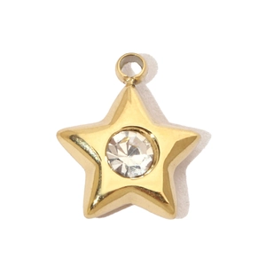 Detailed view of a gold-plated stainless steel star pendant with central sparkling crystal