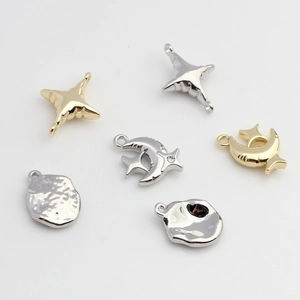 Polished star and moon alloy charms for jewelry making in gold and silver finish