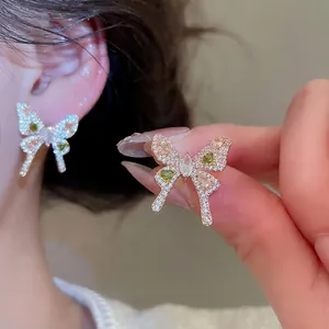Elegant butterfly stud earrings with sparkling cubic zirconia and multi-color gemstones