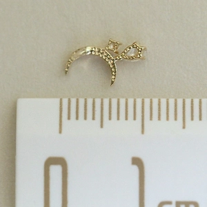 S925 silver 14K gold star moon stud earring on ruler showing 1cm size detail