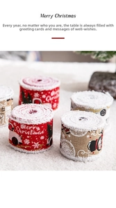 Close-up of red and burlap Christmas ribbons with white fuzzy edges and festive snowflakes