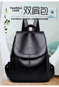 Detail of black lychee leather backpack with flap closure and kangaroo logo embossing