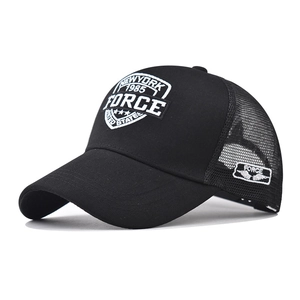 Black trucker hat with white FORCE embroidery and breathable mesh panels in a front view